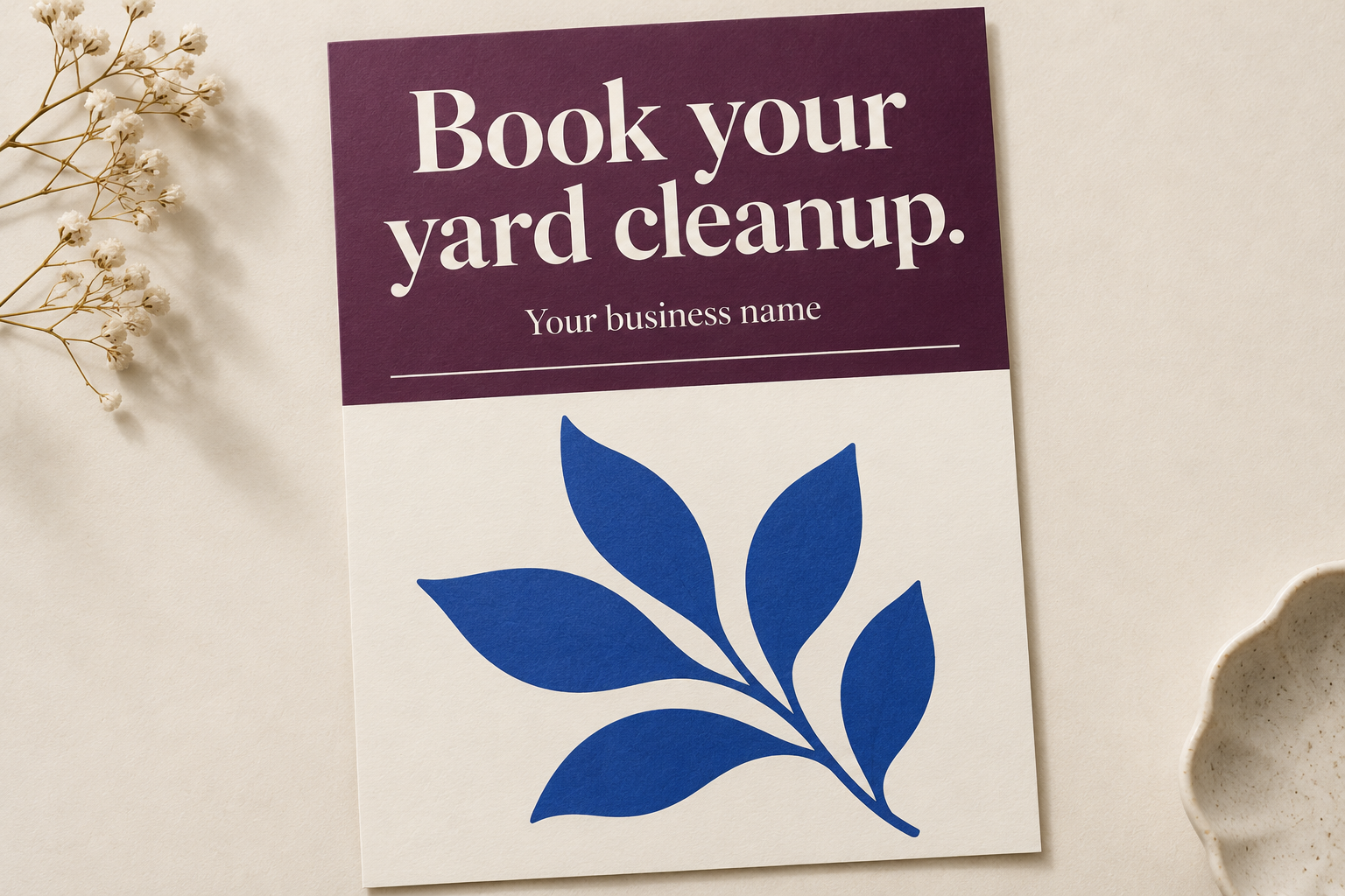 Illustrative flyer with Book your yard cleanup. as the large headline and Your business name smaller below it.
