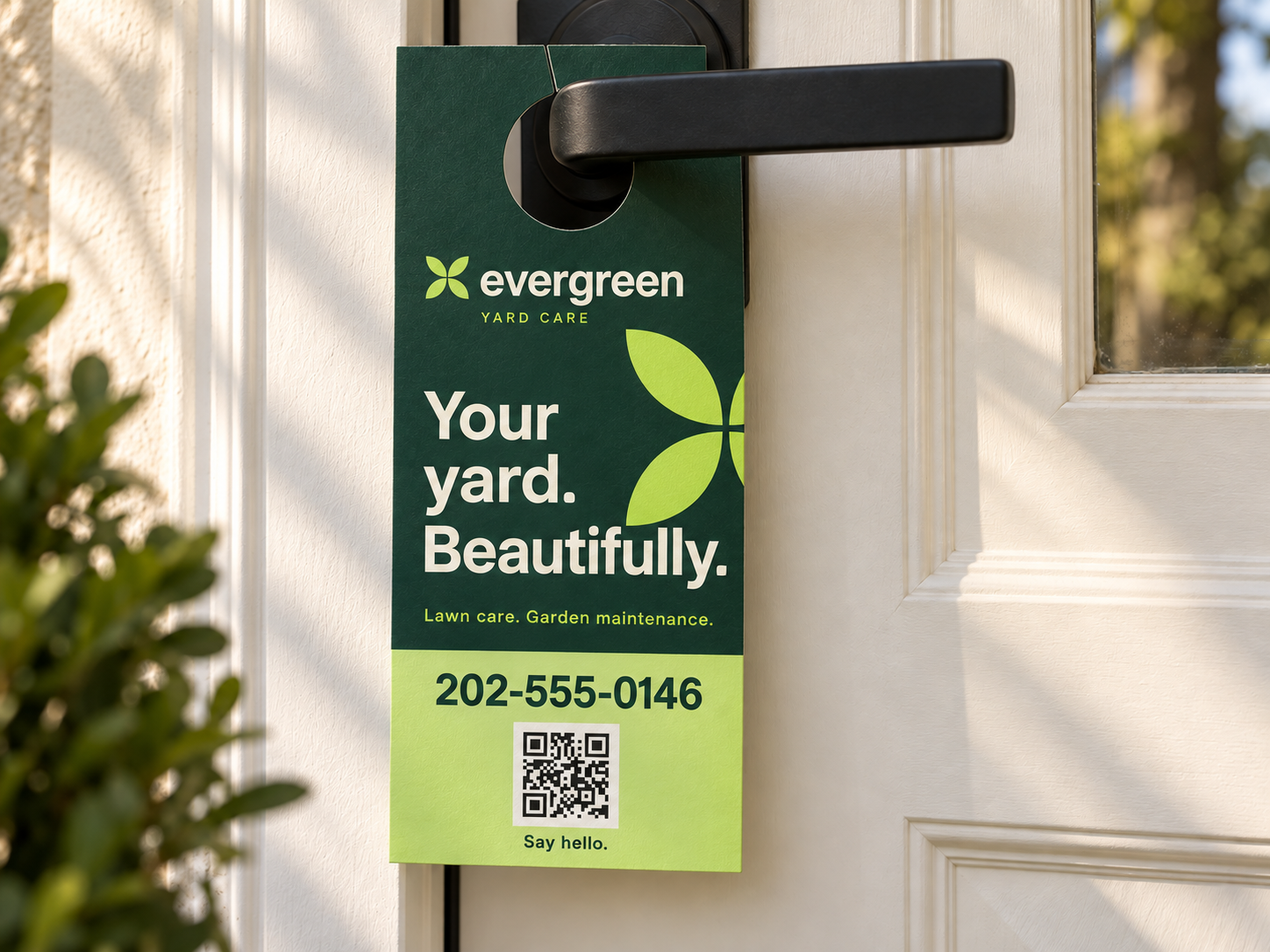 Illustrative door hanger with a sample phone number and QR code